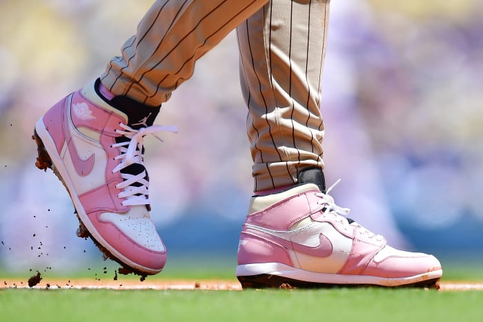 Pink and white Air Jordan cleats worn by Fernando Tatis Jr.